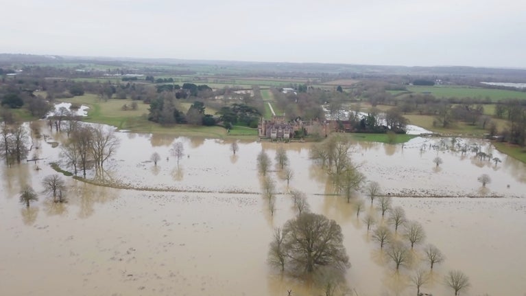 Aerial view of Charlecote house and its flooded park